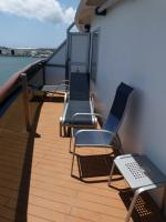 Extended Wrap Around Balcony and Chairs