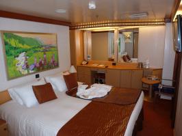 Bed, Bathrobes and Dressing Area