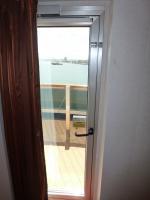 Wrap around balcony door