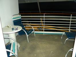 2 chairs, table and 2 loungers on balcony